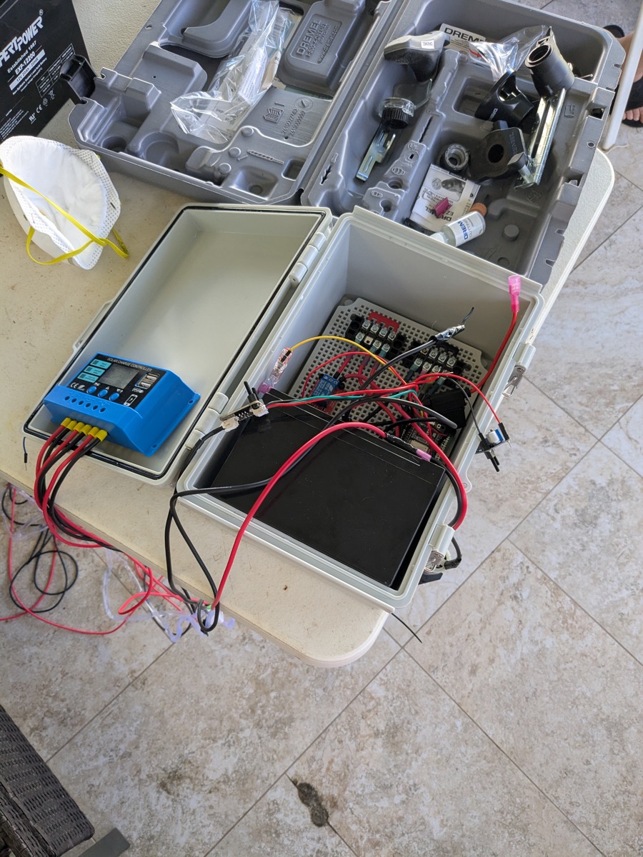 Weatherproof enclosure with charge controller and battery