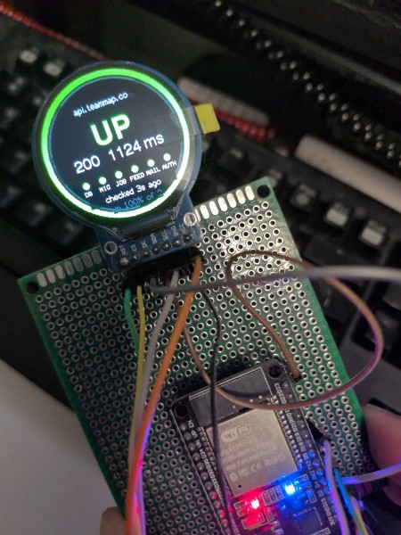 ESP32 uptime monitor showing api.teammap.co UP